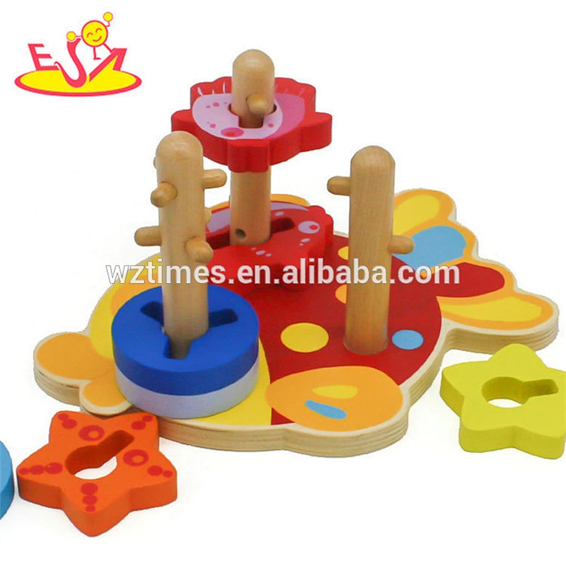 Kinder hölzerne Ringspielspielzeuggeometrie hölzerne werfende Spielwarengeometriekindergarten W13D178
