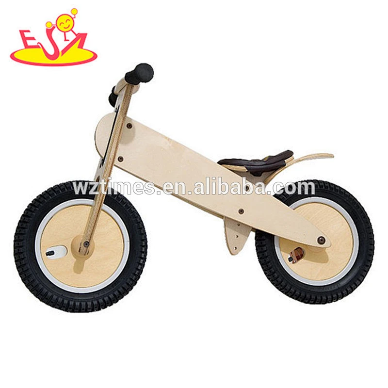 Wholesale simple style wooden children running balance bike with no pedals W16C060