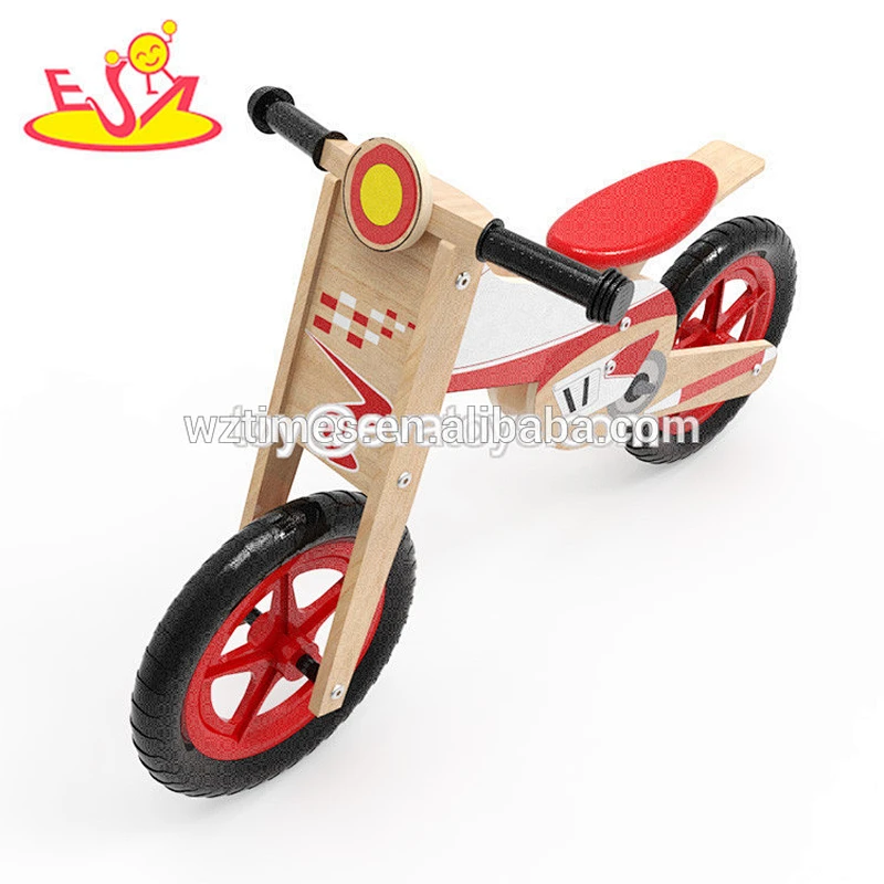 Wholesale high quality red color indoor wooden baby balance bike W16C186