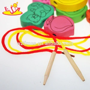 Hölzerner fädelnder großer Schmuck des Großhandelsverkaufs Spielzeug lustiges Einfädeln multi Formkornspielzeug W11E040