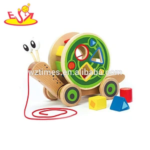 Schnecken-Spielzeugauto W05B155 des Großhandelsqualitätskostens billig hölzerne hölzerne