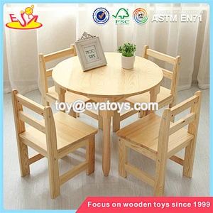 Wholesale simple style kids wooden round table and 4 chairs used in home and school W08G232