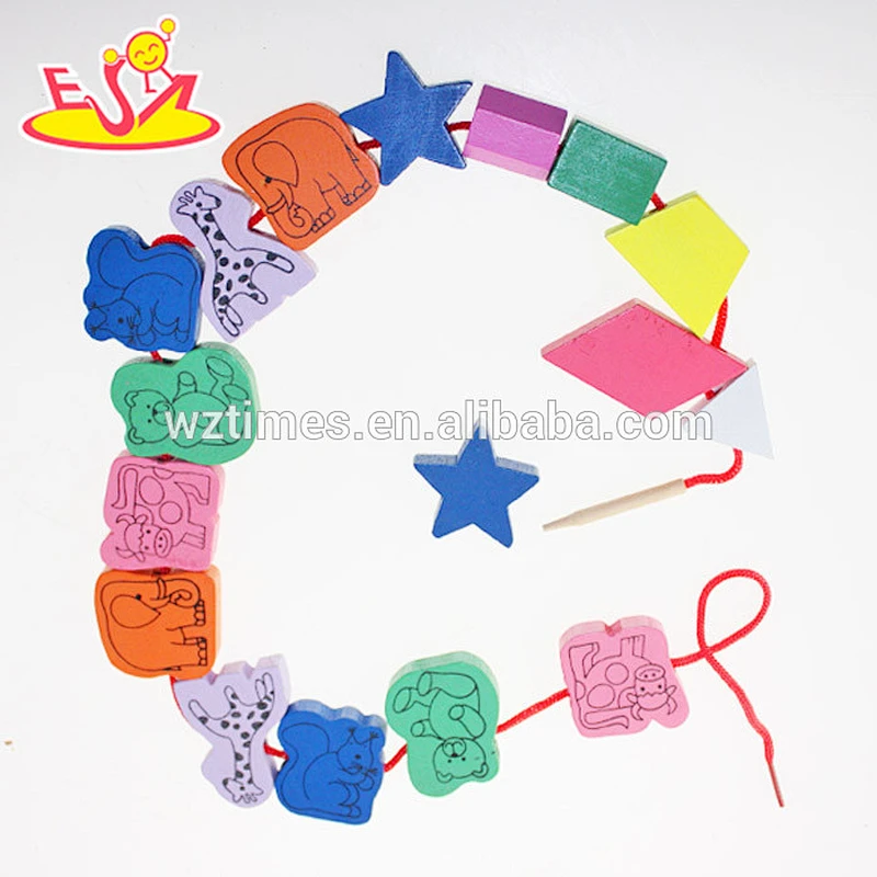Hölzerner fädelnder großer Schmuck des Großhandelsverkaufs Spielzeug lustiges Einfädeln multi Formkornspielzeug W11E040