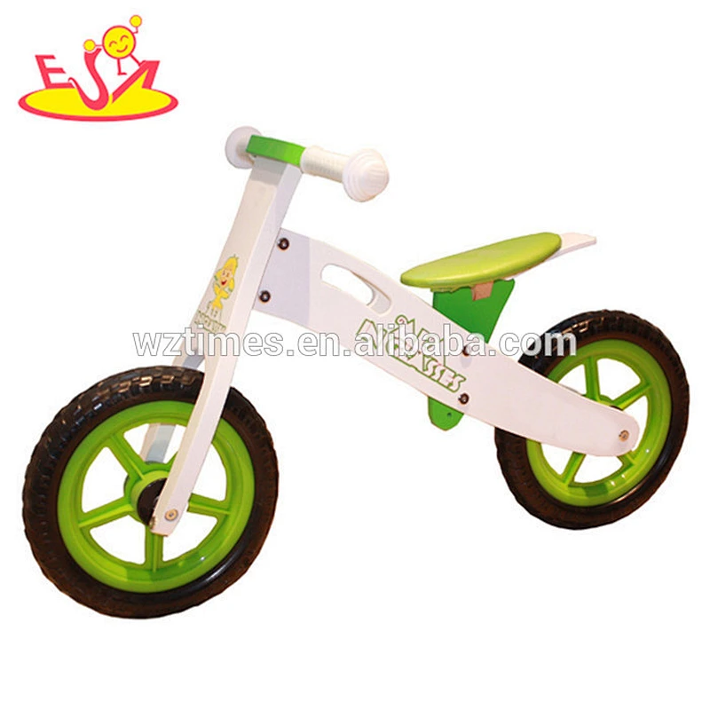 Wholesale lovely wooden ride on balance bike without pedals used for 2 years old up baby W16C073