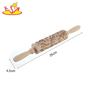 Wholesale wooden rolling pin christmas wooden embossing rolling pin with christmas symbols W02B050
