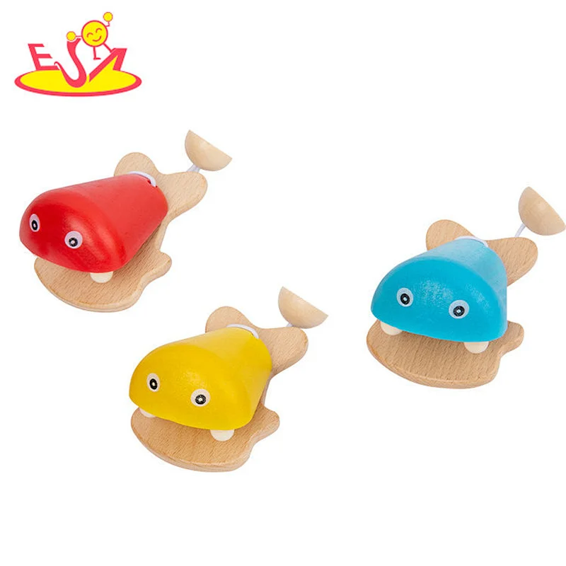 Juguetes de instrumentos musicales de castañuelas de madera con forma de pez de dibujos animados para niños W07I188