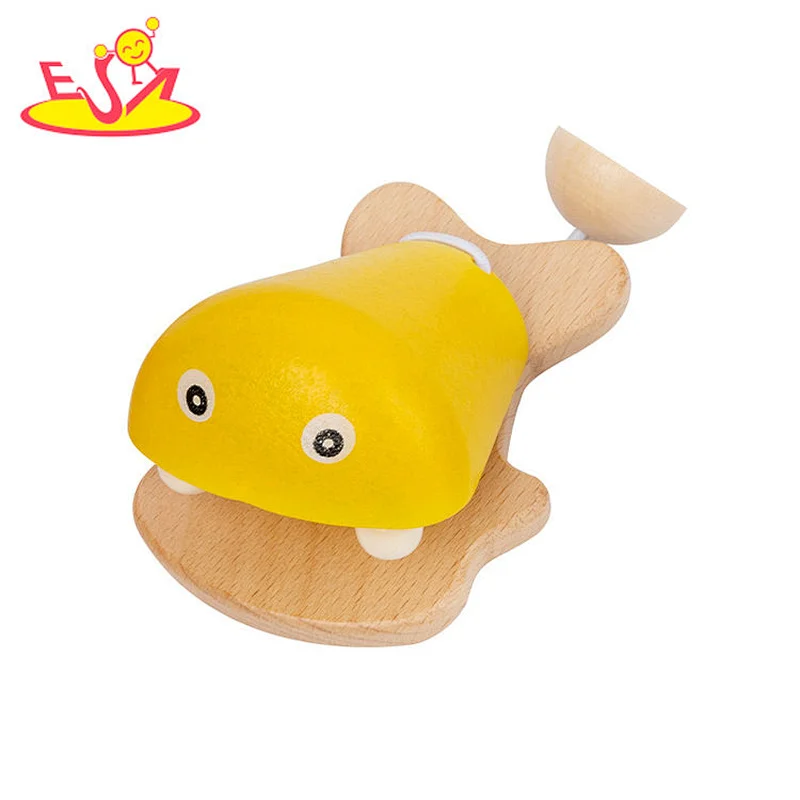 Juguetes de instrumentos musicales de castañuelas de madera con forma de pez de dibujos animados para niños W07I188