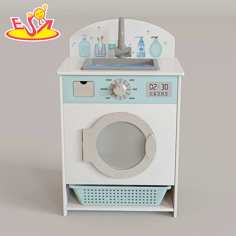 Kinder im neuen Design spielen eine hölzerne Waschmaschine mit Waschbecken W10D458