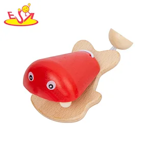 Juguetes de instrumentos musicales de castañuelas de madera con forma de pez de dibujos animados para niños W07I188