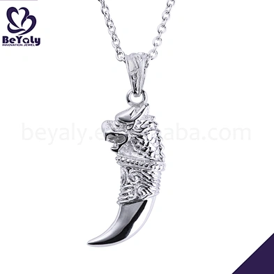 Delicate silver tooth engraved totem pendants
