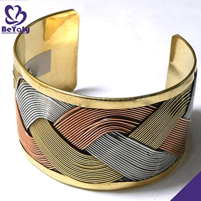 Twist raised grain design gold bangles designs price