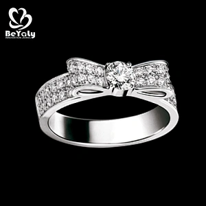 Simple bespoke bow design cubic zirconia 925 silver wedding rings