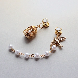 Simple birdcage tassel pearls manual painless invisible coil ear clip asymmetrical earrings