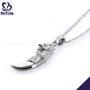 Delicate silver tooth engraved totem pendants