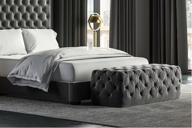 grey tufted bed