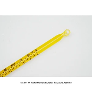 Alkoholtermometer, gul bakgrunn, rød fylt