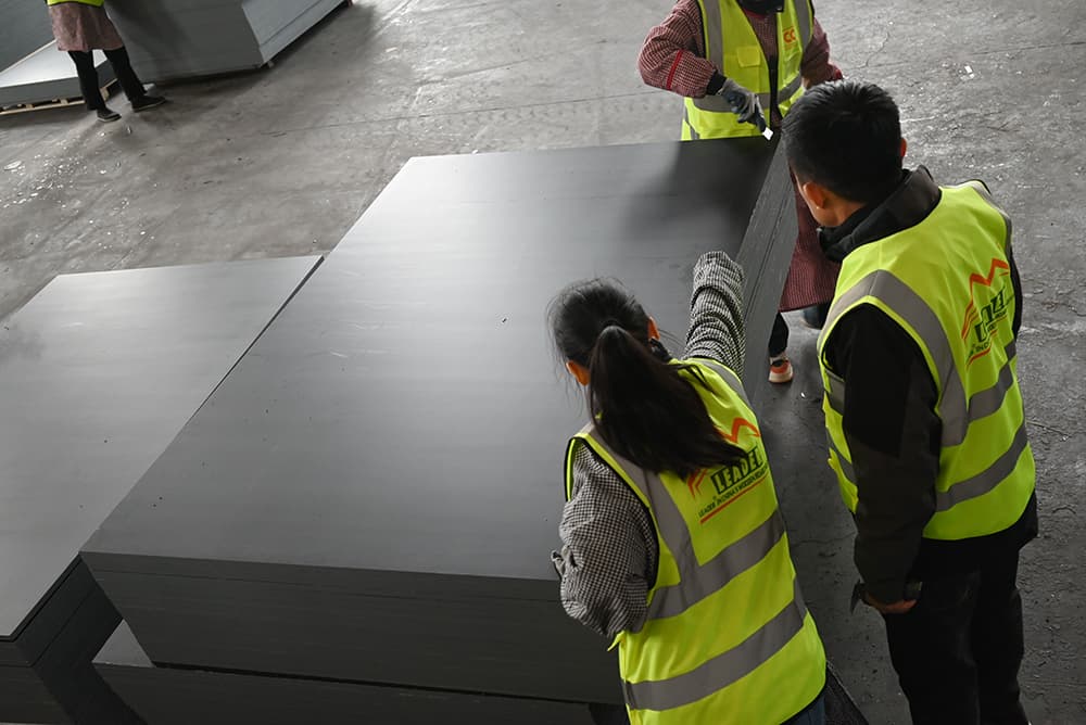Employees inspecting products together