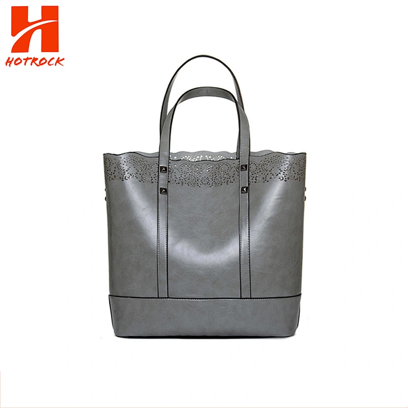 The New 2019 simple and retro hollow out carving single shoulder PU handbag