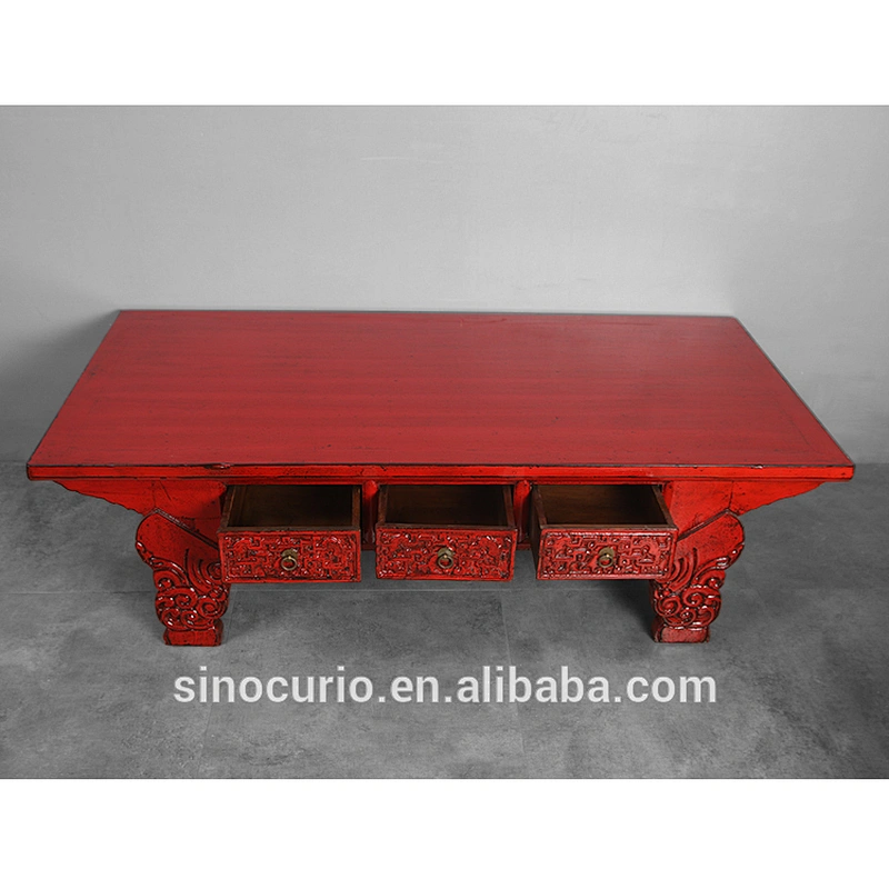 Antique carved coffee table with drawers