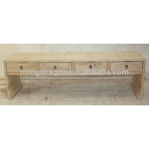 Four drawer natural wood table