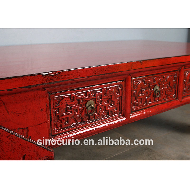 Antique carved coffee table with drawers