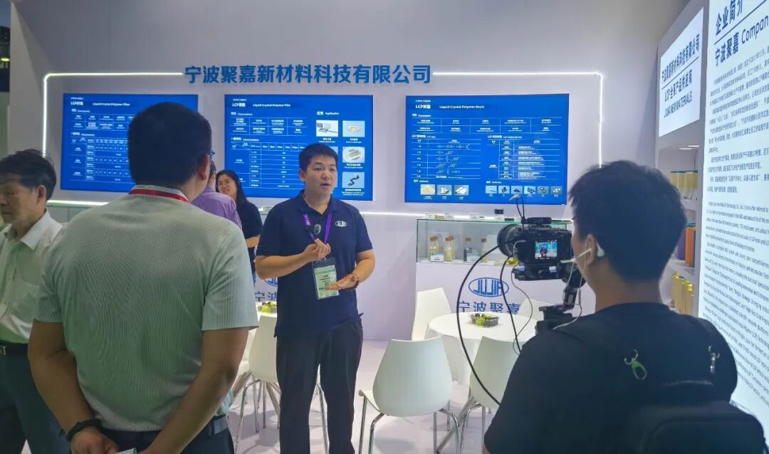 Explaining the product at the exhibition