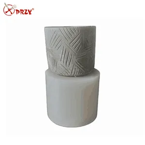 Silicone mold on cylindrical surface with texture used to make cement flower pot