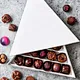 rigid paper packaging
embossed gift boxes
food-grade packaging
 fancy chocolate box
Premium luxury chocolate packaging
Food safe gift boxes
Custom shaped chocolate boxes
Chocolate bar packaging box for sweater
Customized triangle chocolate box
UV matt lam