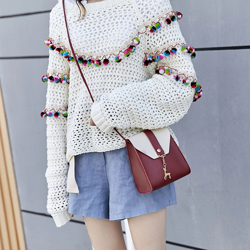 Wholesale Korean PU Leather Crossbody Bags Contrast Color Handbags For Girls With Deer Pendant