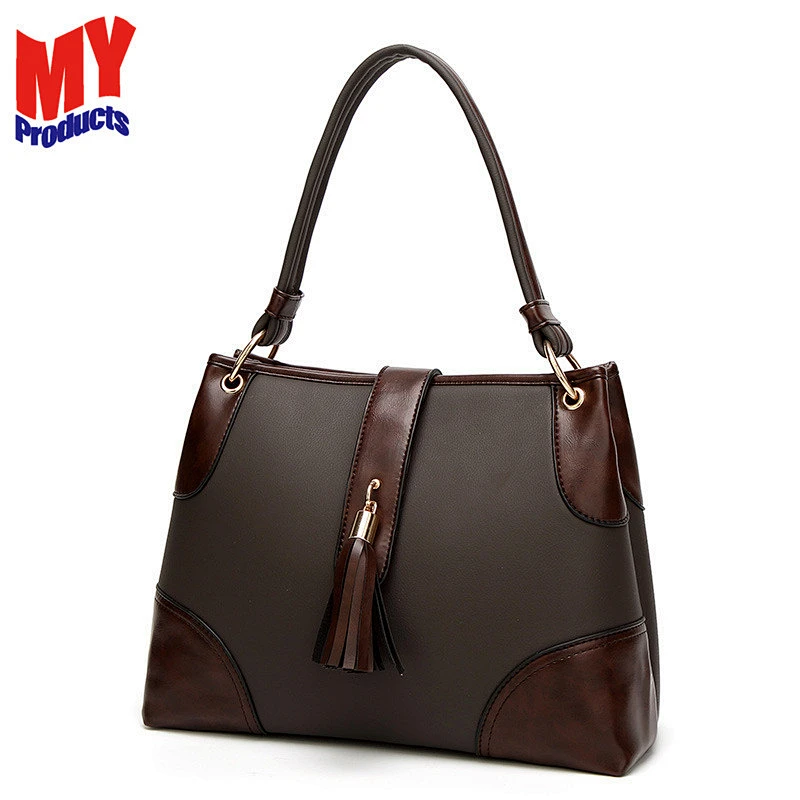 Alibaba latest new style fashion genuine leather solid ladies handbags