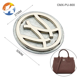 Circle With Cut Out Logo Custom Made Metal Logo Charms