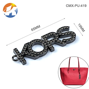 Siamese Letters Gunmetal Hang Metal Logo Design