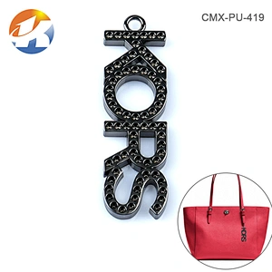 Siamese Letters Gunmetal Hang Metal Logo Design