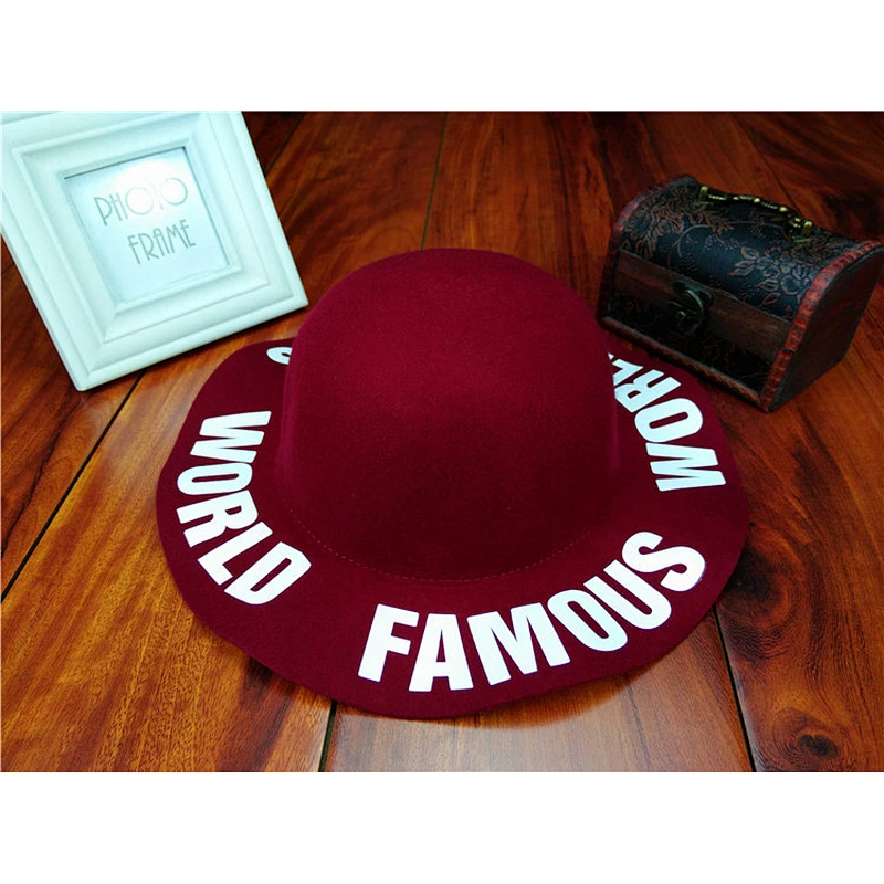 Autumn and winter Europe France wind color wool woolen leather ornaments hat female wild jazz fashion felt hat