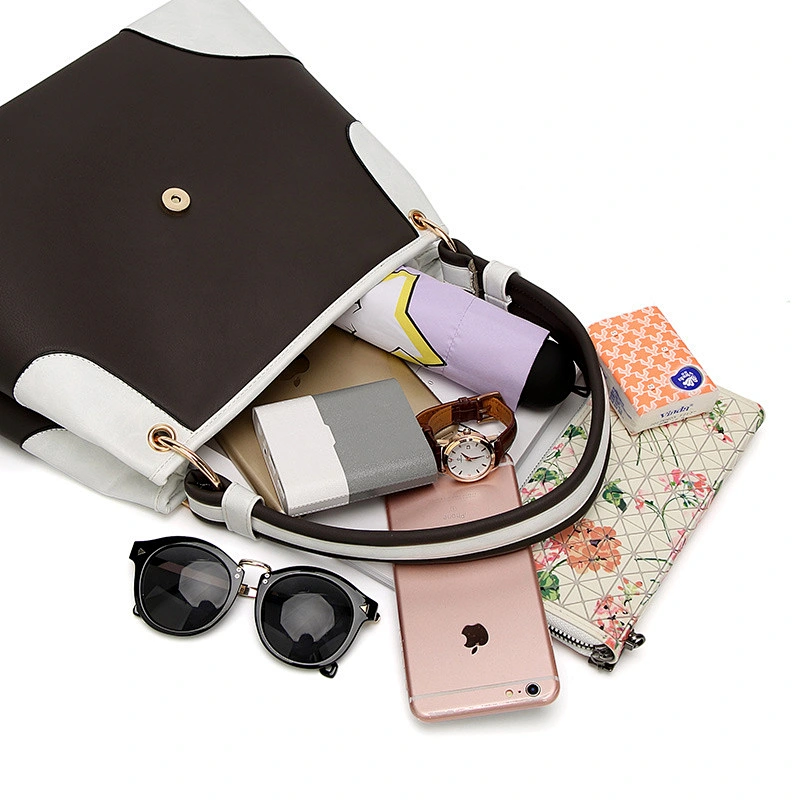 Alibaba latest new style fashion genuine leather solid ladies handbags