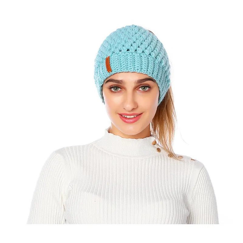 Winter Ladies Pure Color Ponytail Knitted Hat Fashion Hollow Ear Protection Woolen Hat