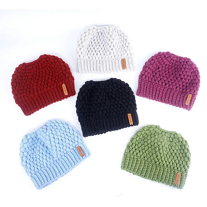 Winter Ladies Pure Color Ponytail Knitted Hat Fashion Hollow Ear Protection Woolen Hat