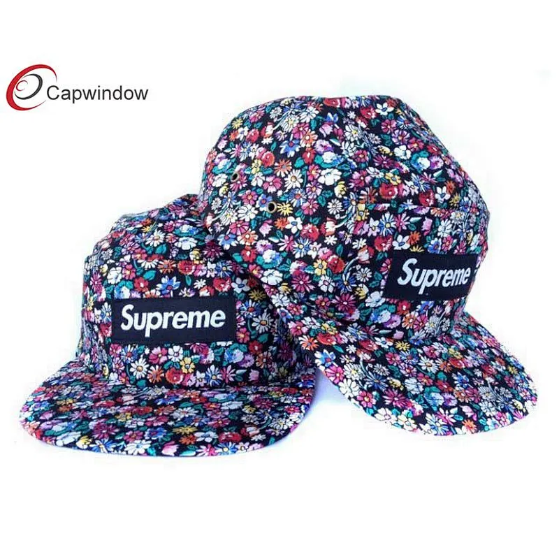 Allover Floral Printed 5 Panel Camper Cap With Woven Label Logo On Front