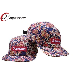 Allover Floral Printed 5 Panel Camper Cap With Woven Label Logo On Front