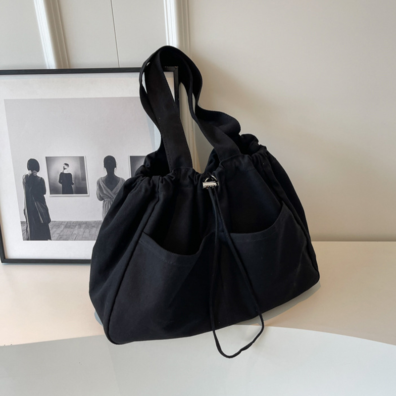 Explore the unique design features of drawstring tote bag, their versatile uses, and how XINHUI offers customizable options.