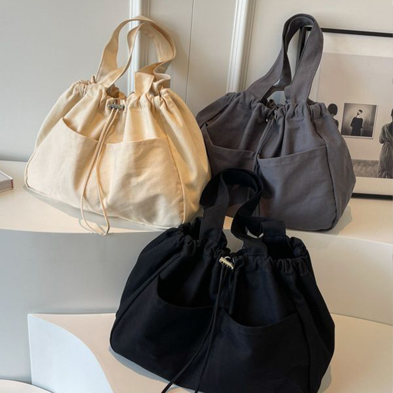 Explore the unique design features of drawstring tote bag, their versatile uses, and how XINHUI offers customizable options.