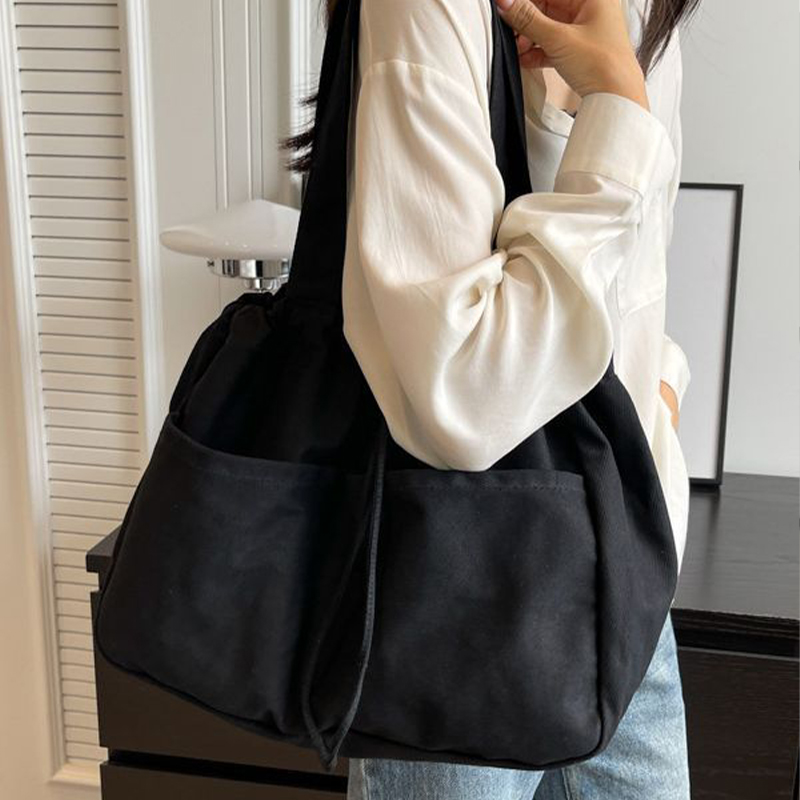 Explore the unique design features of drawstring tote bag, their versatile uses, and how XINHUI offers customizable options.