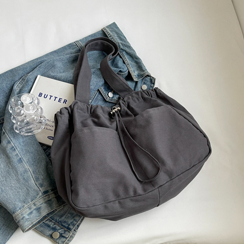Explore the unique design features of drawstring tote bag, their versatile uses, and how XINHUI offers customizable options.