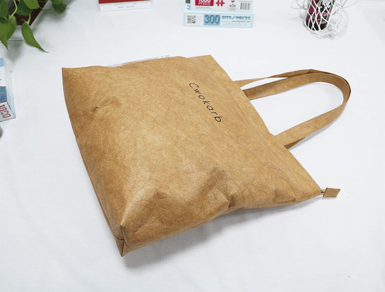 Explore the unique design features of tyvek tote bag, their versatile uses, and how XINHUI offers customizable options.