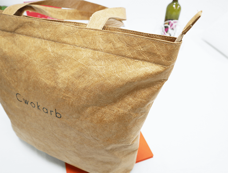 Explore the unique design features of tyvek tote bag, their versatile uses, and how XINHUI offers customizable options.