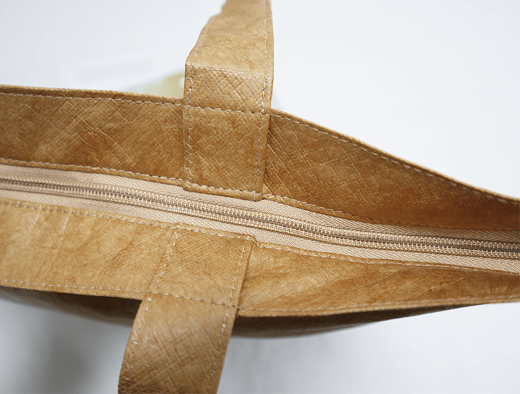 Explore the unique design features of tyvek tote bag, their versatile uses, and how XINHUI offers customizable options.