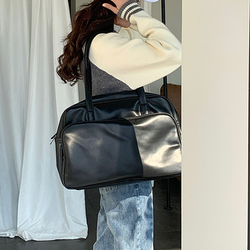 Explore the unique design features of black faux leather tote bag, their versatile uses, and how XINHUI offers customizable options.