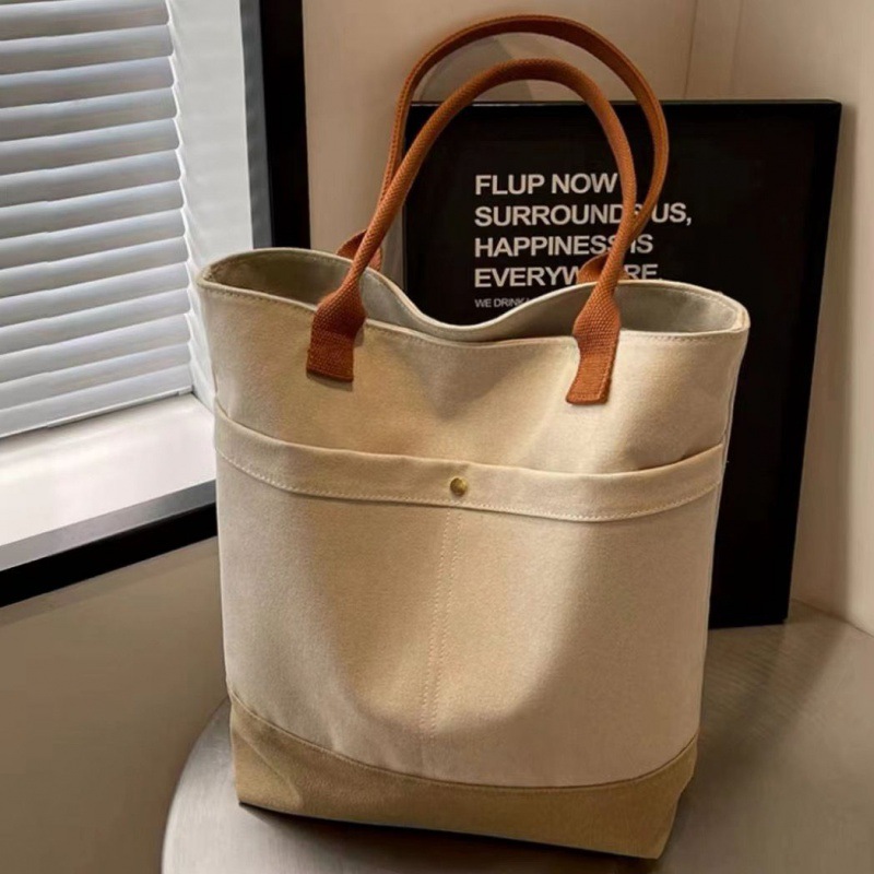 Explore the chic design features of canvas tote beach bags, their suitability for beach outings