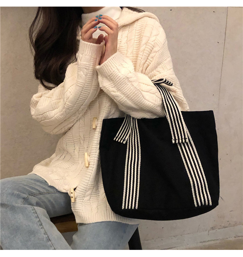 Explore the unique design features of canvas beach tote, their versatile uses, and how XINHUI offers customizable options.