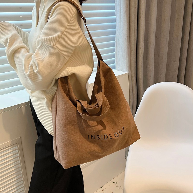 Explore the unique design features of brown shoulder bag, their versatile uses, and how XINHUI offers customizable options.
